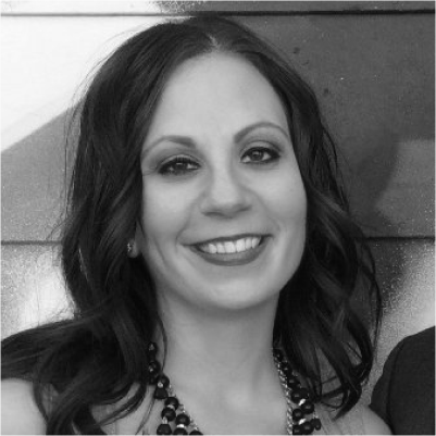 Headshot of Tiffany Hartkemeyer, greyscale