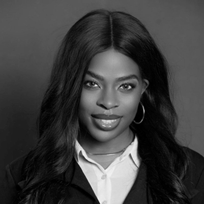 Headshot of Tylin Woodstock, greyscale
